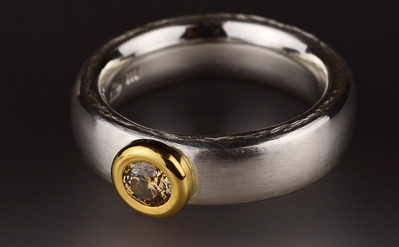 Pure silver, 22ct gold and diamond ring 1903